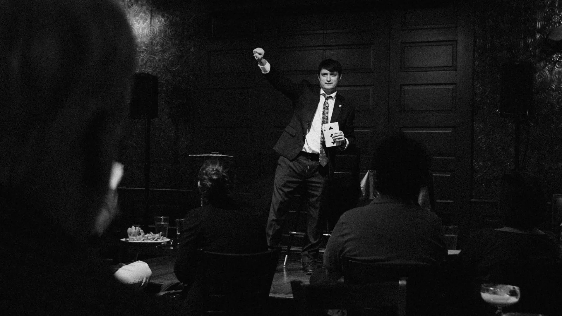 A magician working close to guests at the St Louis magic show in the Golden Hoosier upstairs lounge